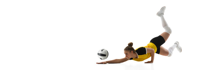 Flyer. Young female volleyball player isolated on white studio background. Woman in sportswear...