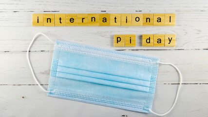 International pi Day.words from wooden cubes with letters