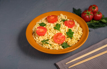 Asian food. Noodles with tomatoes and herbs