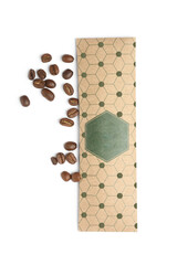 Scented sachet and coffee beans on white background, top view