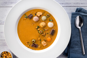 fancy bowl of soup with bread