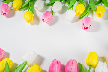 Easter Background Tulips Bouquet, Big Colorful Tulip Flower Bouquet on white table background top view copy space for text