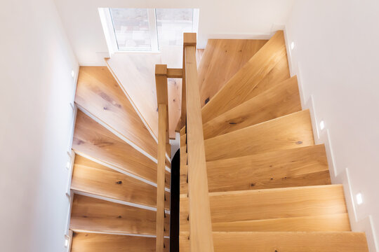 Wood Staircase Inside Contemporary White Modern House.