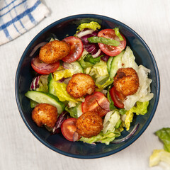 green salad with deep fried mozzarella