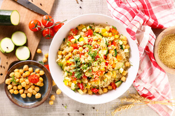 bowl of vegetarian couscous and ingredients