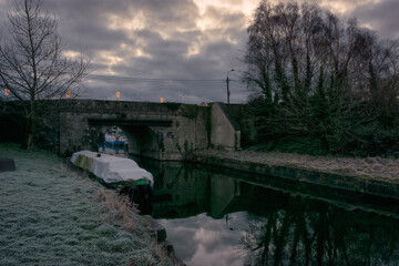 Fototapeta premium Sleepy Irish Canal with Barge Boats and Stone Bridge