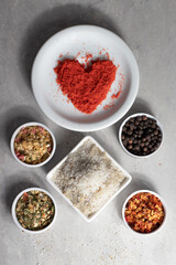 Spices or seasonings (paprika, chimichurri, black pepper, red pepper flakes and coarse salt).