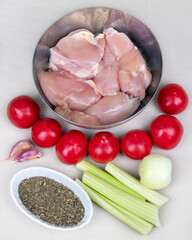 The ingredients for cooking chicken with vegetables
