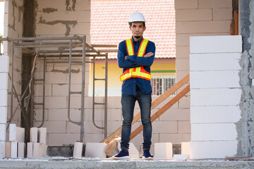 Architect worker Engineer soft focus standing on site construction work building house