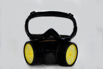 Naklejka premium Black mask, respirator on a white background. Protect your airways.