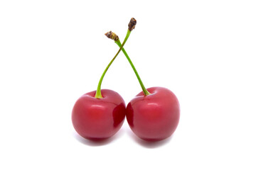 Two cherry berries on white
