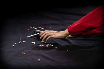 Drugs concept. Drug addict woman with syringe using drugs, Asian girl with syringe using drugs.