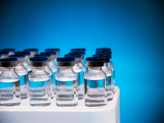 Group of Vaccine bottles. Medicine in ampoules. Glass vials for liquid samples in laboratory.