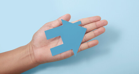 Obraz premium Hands holding paper house, family home protecting insurance concept
