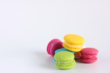 Fototapeta na wymiar Group of mini Macaron, delicious dessert or snack pastel colour