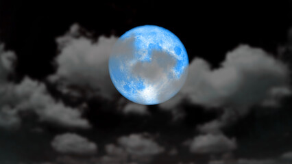 full cold blue moon rise back blur dark cloud on the night sky