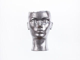 Fototapeta na wymiar abstract silver mannequin head isolated on white background