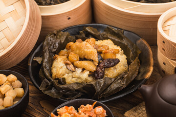 Steamed chicken with lotus leaf sticky rice