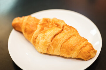 Homemade Butter Croissants in White Plates