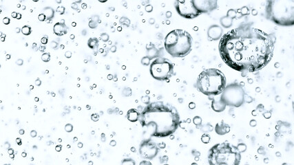 Light bubbles of water isolated over white, macro shot.