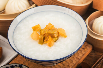 Chinese porridge breakfast set, fried dough sticks, white porridge,