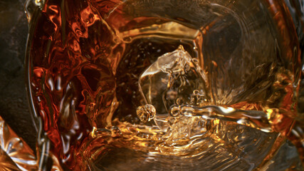 Ice Cube falling into Glass of Whisky, Top Shot, Freeze Motion.