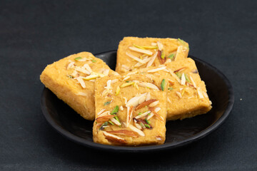 Indian Mithai Lachedar Patisa With Various Names Soan Papdi San Papdi Sohan Papdi Sukhdi Or Sonpapdi Son Roll Is Made Of Gram Wheat Flour Besan Kaju Pista Badam Dry Fruits Jaggery Fried In Desi Ghee