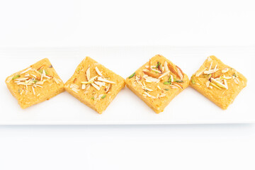 Indian Mithai Lachedar Patisa With Various Names Soan Papdi San Papdi Sohan Papdi Sukhdi Or Sonpapdi Son Roll Is Made Of Gram Wheat Flour Besan Kaju Pista Badam Dry Fruits Jaggery Fried In Desi Ghee