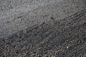 New asphalt tarmac texture road of repairing on the damaged highway