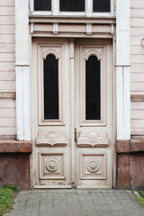 old wooden vintage double doors with windows