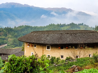 Fototapeta na wymiar Landscape of Tianluokeng tulou cluster,located in Nanjing town,Fujian,China