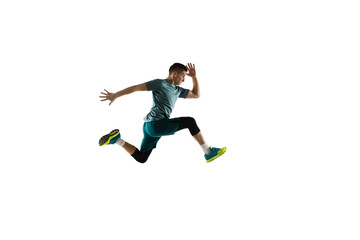 Fototapeta na wymiar Flying. Young caucasian male model in action, motion isolated on white background with copyspace. Concept of sport, movement, energy and dynamic, healthy lifestyle. Training, practicing. Authentic.