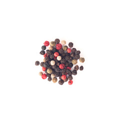Top view of black, white, green and pink peppercorns isolated on white background