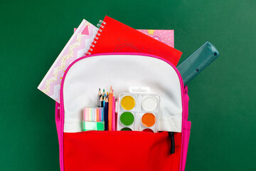 Back to school concept backpack full of school supplies