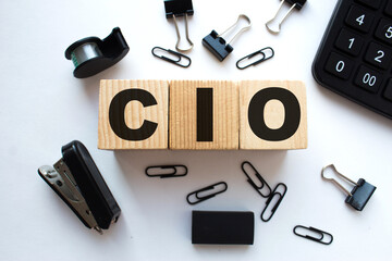 a word CIO on wooden cubes. business concept. business and Finance