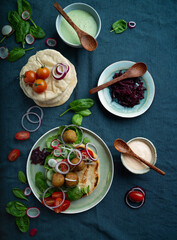 Home made vegan falafel  served with various mezze and pita bread