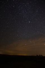 Fototapeta premium a long exposure of the dark sky with the stars