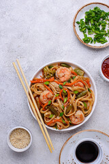 Wok with noodles, shrimps and vegetables
