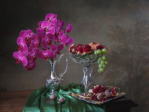Still life with pink orchids and fruits