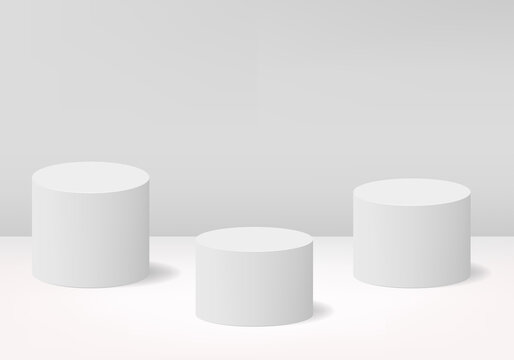 White 3d realistic cylinder shape podium. 3 empty stages for product presentation. Minimal scene vector illustration.