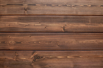 Naklejka premium Background from wooden dark brown horizontal vintage boards as abstract texture copy space