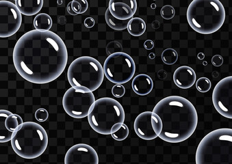 Round transparent clean realistic soap bubbles on a transparent abstract background. Vector