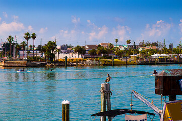 Johns Pass is a shopping and tourist attraction on the Gulf Coast of Florida in the town of Madeira Beach. Originally a fishing village