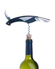 Travel corkscrew opener with wine bottle on white background isolation