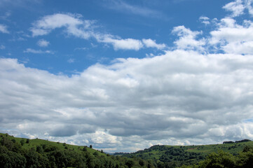 Obraz na płótnie Canvas Clouds over the mountains