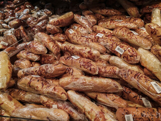 Display window with various bakery products in grocery store