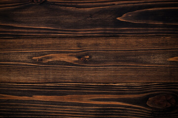 Old dark brown wooden wall, detailed photo background texture. Wooden fence. Background for your works. 