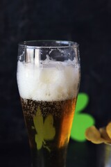 Patrick's day, beer, shamrock on a dark background, party, congratulations, postcard