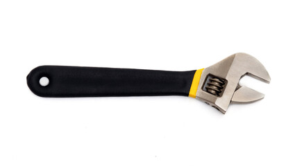 Adjustable wrench with rubber handle on white isolated background. It is used in the repair or...