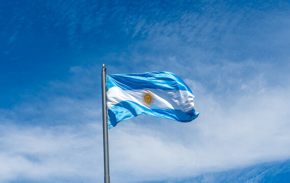 Argentina's flag and the sky of Buenos Aires
